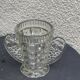 Angel wings vase, in transparent glass with art deco relief pattern