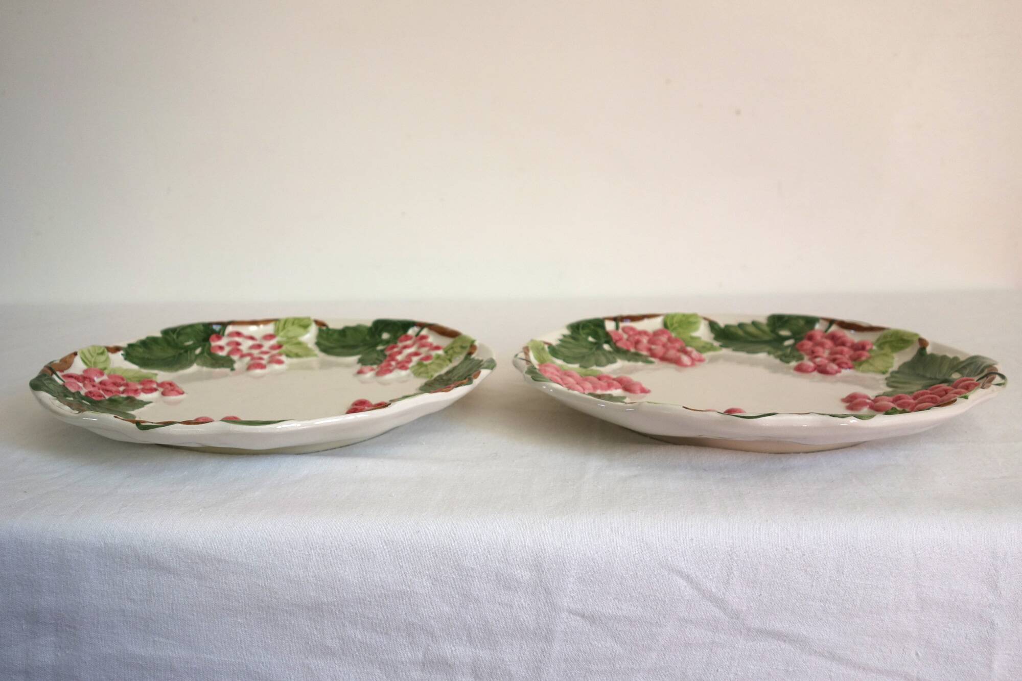 2 vintage barbotine grapes plates signed Francesco Guarino