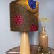 Table lamp in blond wood with handmade wax shade