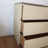 Chest of drawers with travertine