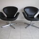 Swan armchairs in black leather by Arne Jacobsen for Fritz Hansen