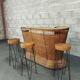Vintage rattan and metal bar and its stools.