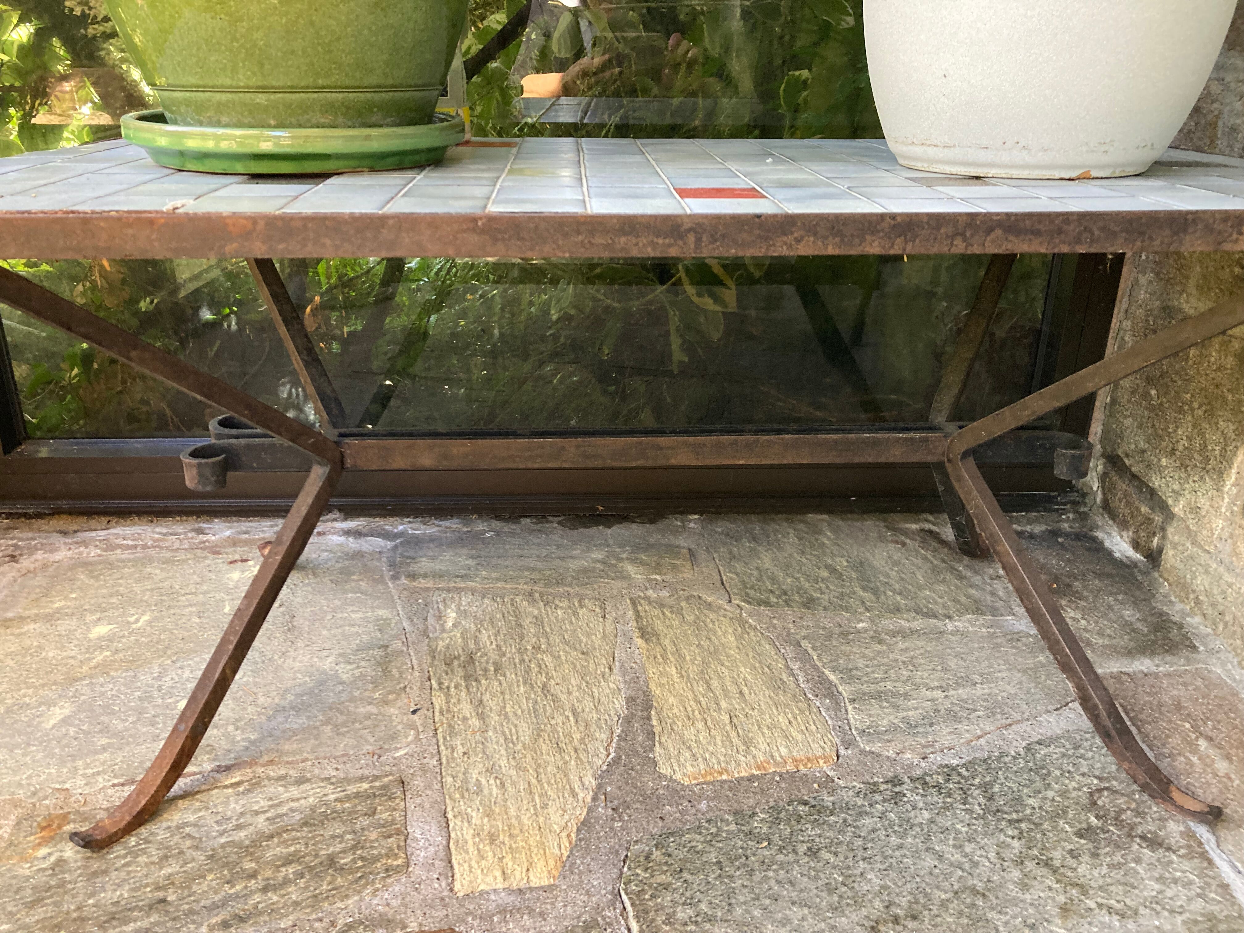 Coffee table, ceramic top, wrought iron foot