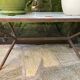 Coffee table, ceramic top, wrought iron foot