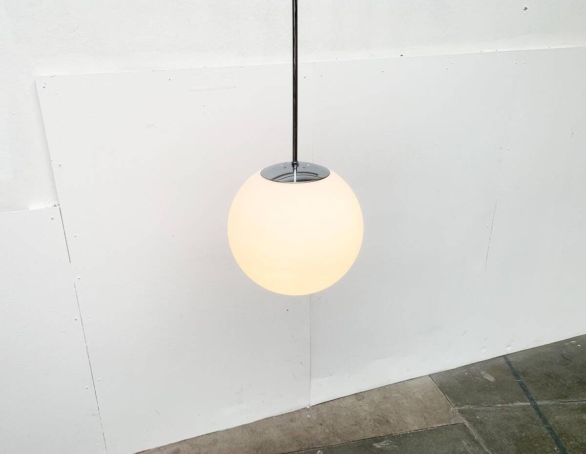 Vintage glass ball pendant lamp in German space style by Limburg.