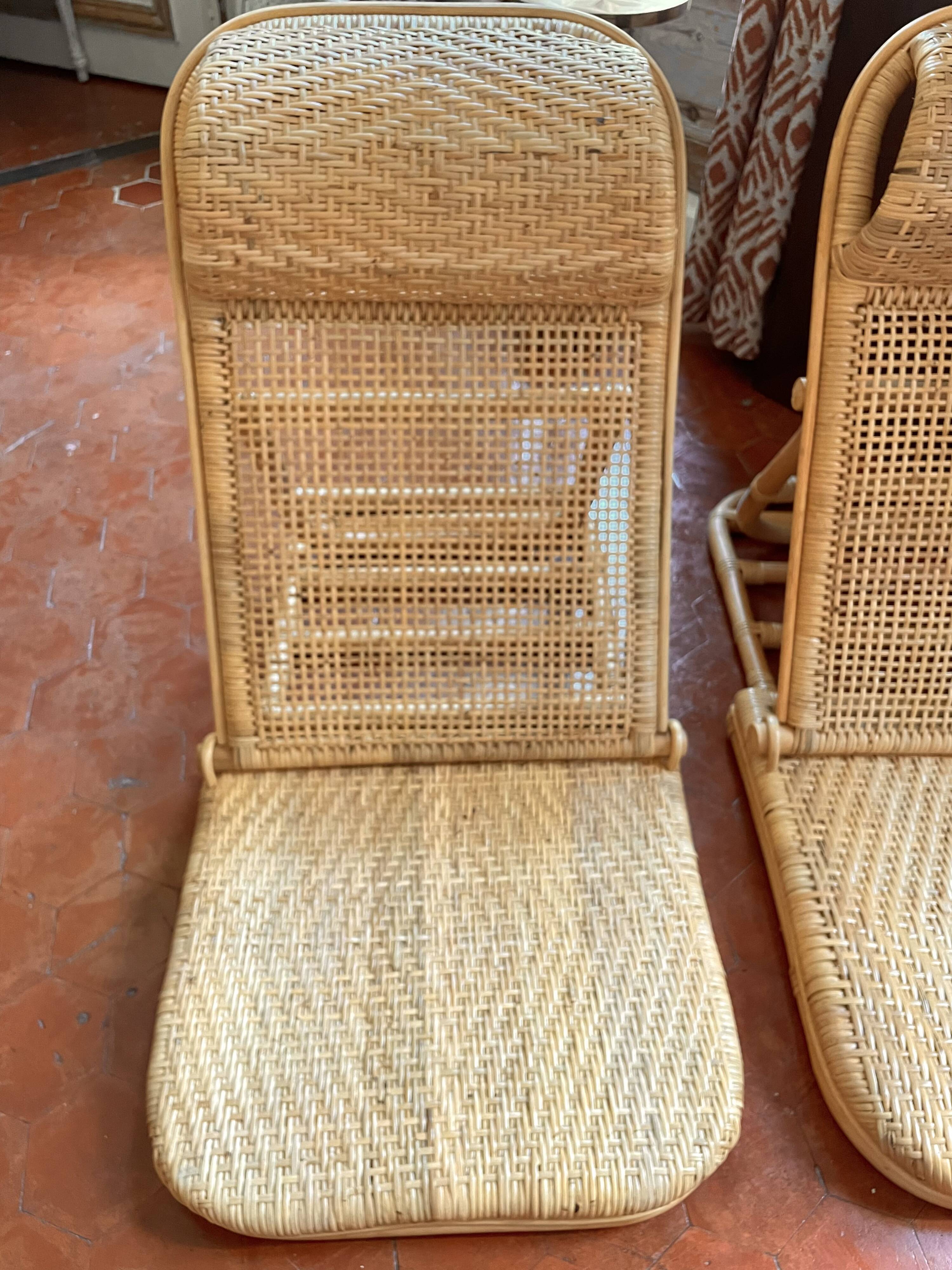Paire de fauteuils pliables  en rotin
