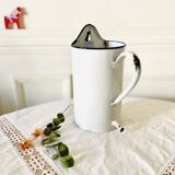 Old medical fountain in white enameled sheet metal