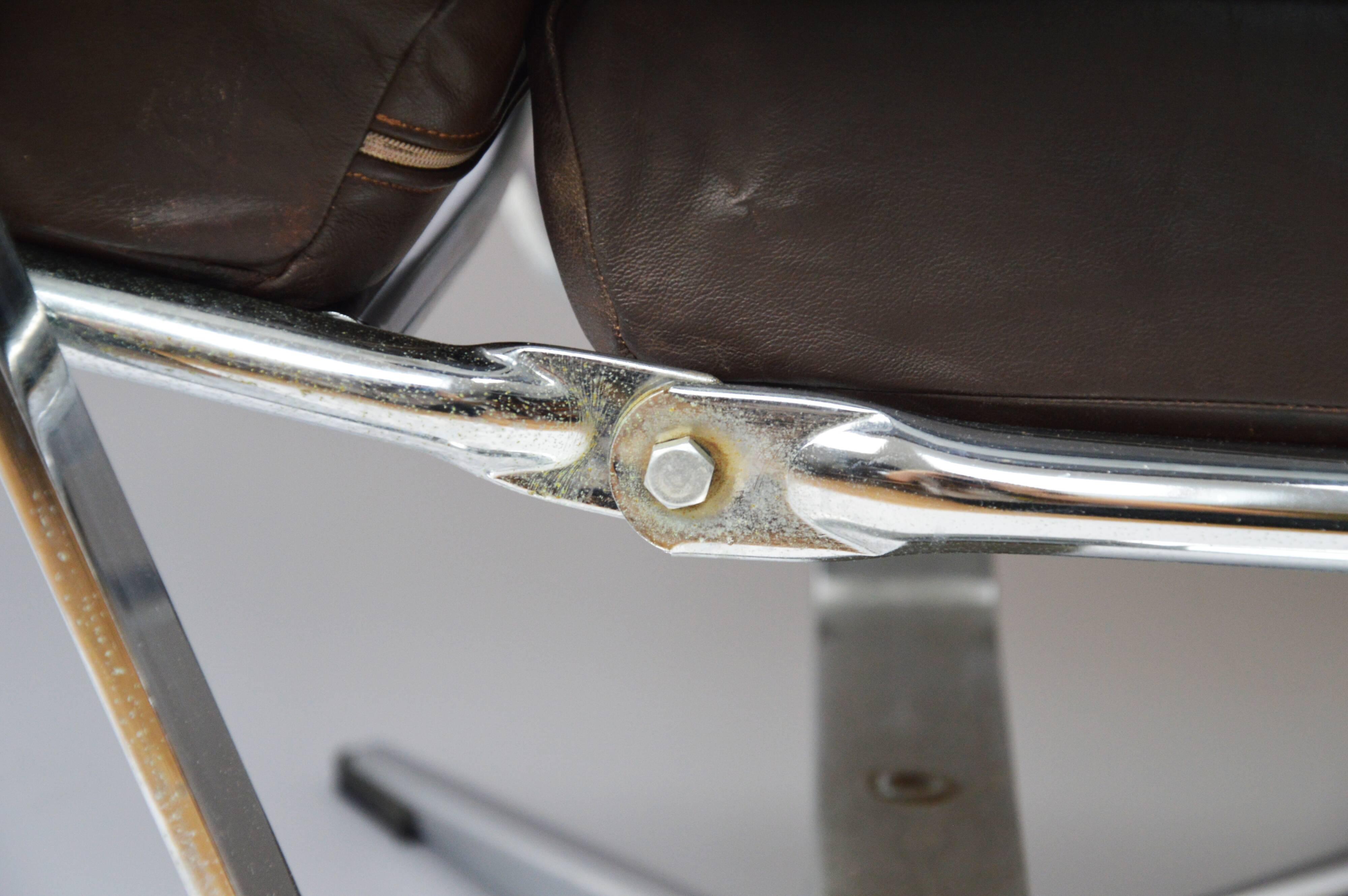 A pair of leather armchairs, 1970s