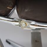 A pair of leather armchairs, 1970s