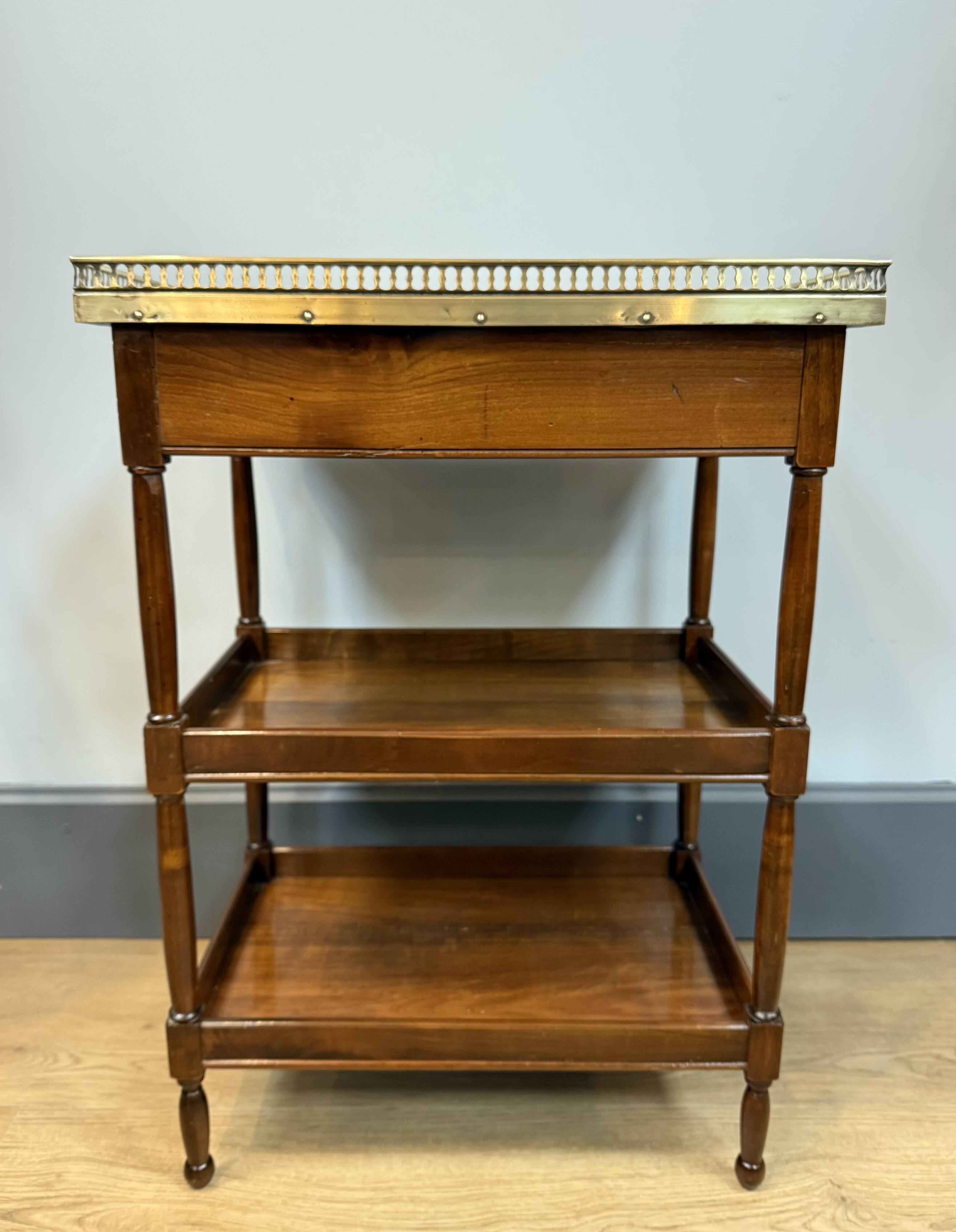 Small mahogany side table in Louis XVI style.