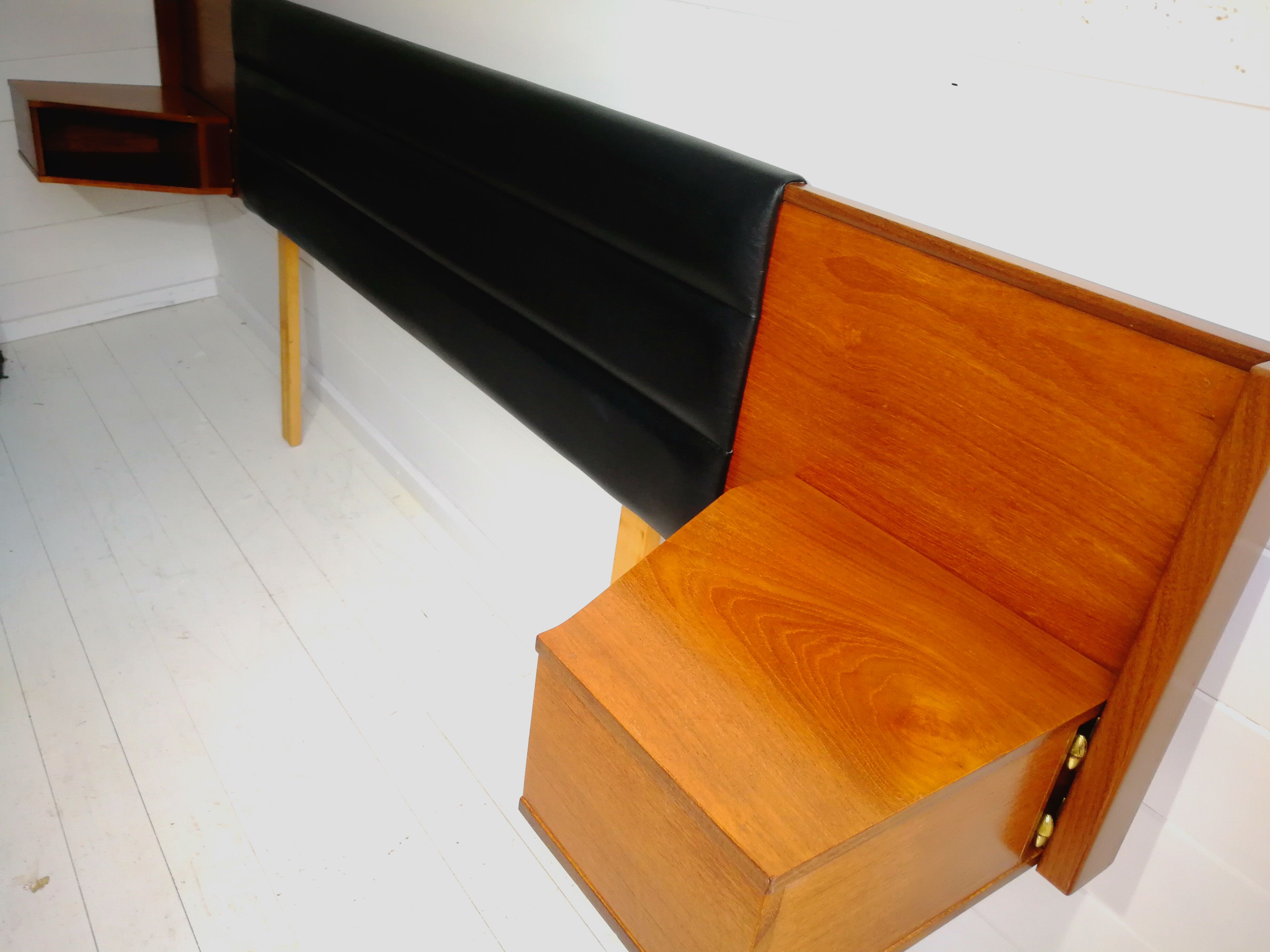 Mid century 1970s retro teak headboard with two hinged bedsides, upholstered in black by 'slumberlan