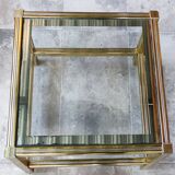 Small designer coffee table in gold metal