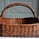 Handmade woven and dyed willow harvest basket.