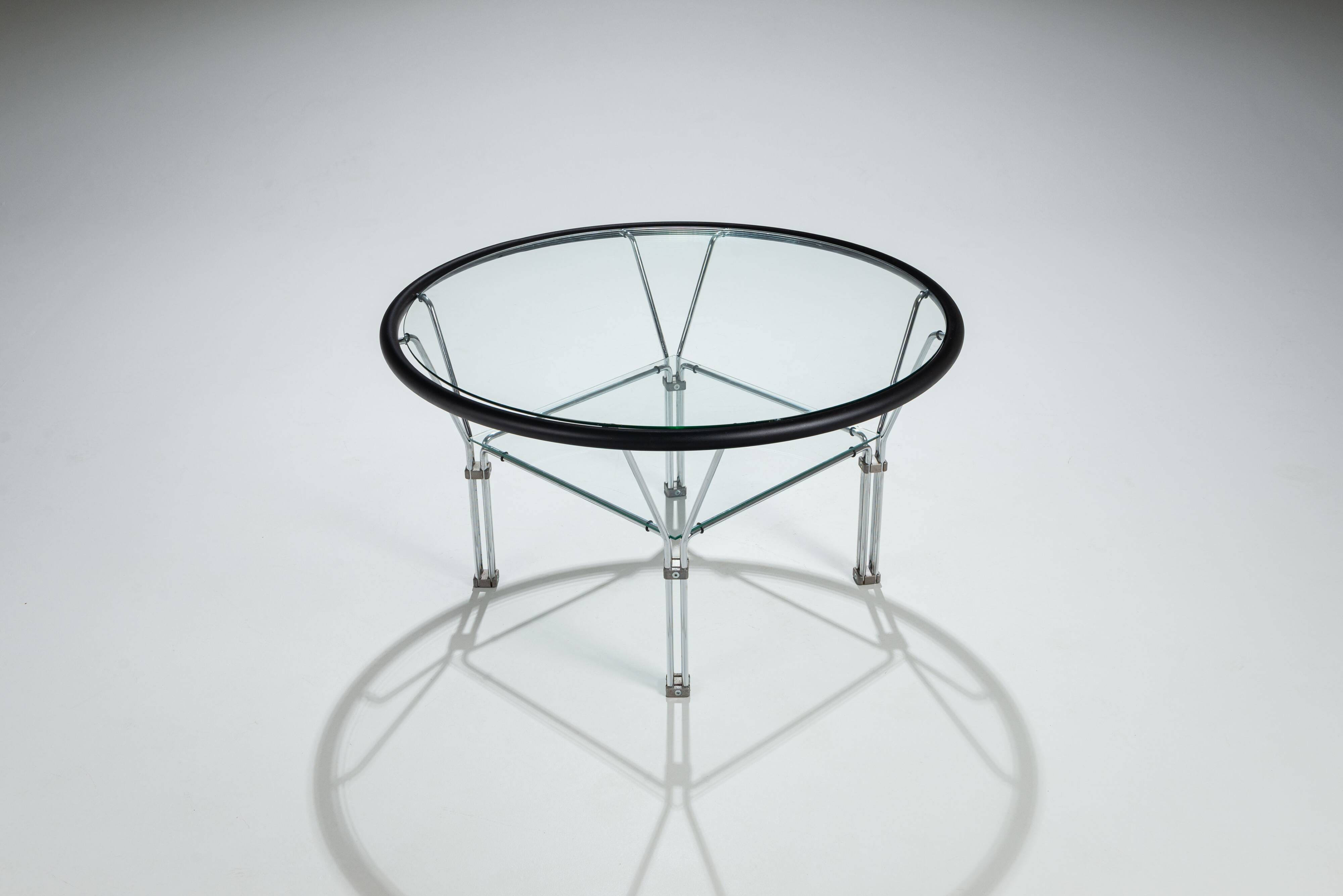 Post-Modern round glass and steel coffeetable attributed to Niels Bendtsen
