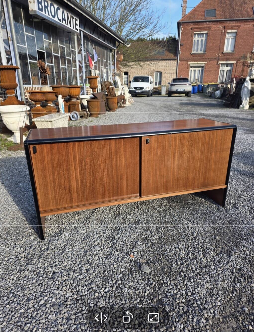 Vintage sideboard with sliding doors from the 60s