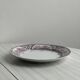 Antique plate with purple oriental decoration