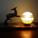 Art deco table lamp, marble, opaque glass and granite, animal in bronze patinated regulator