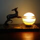 Art deco table lamp, marble, opaque glass and granite, animal in bronze patinated regulator