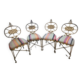Four Gilbert Poillerat chairs