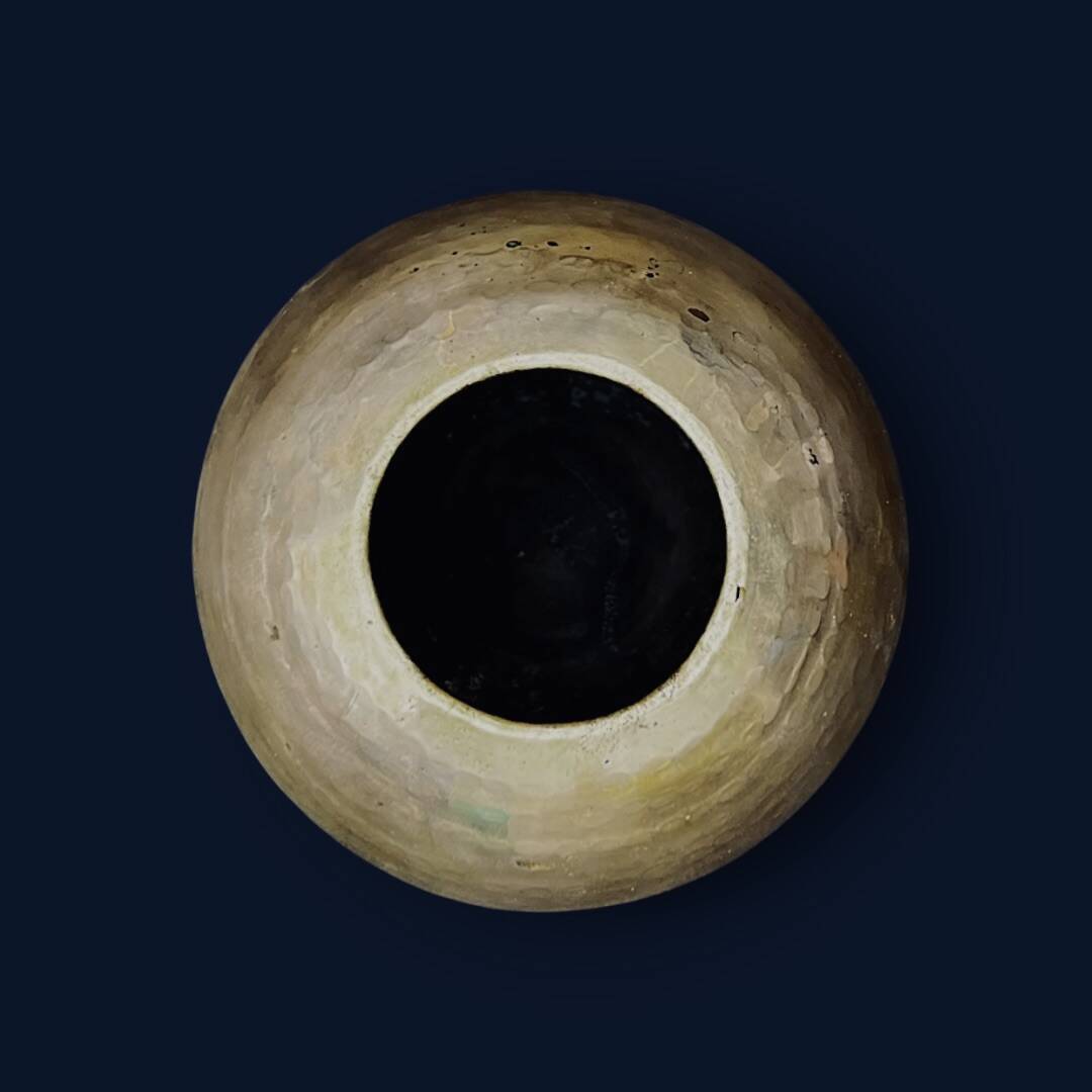 Antique decorative round vase in hammered brass