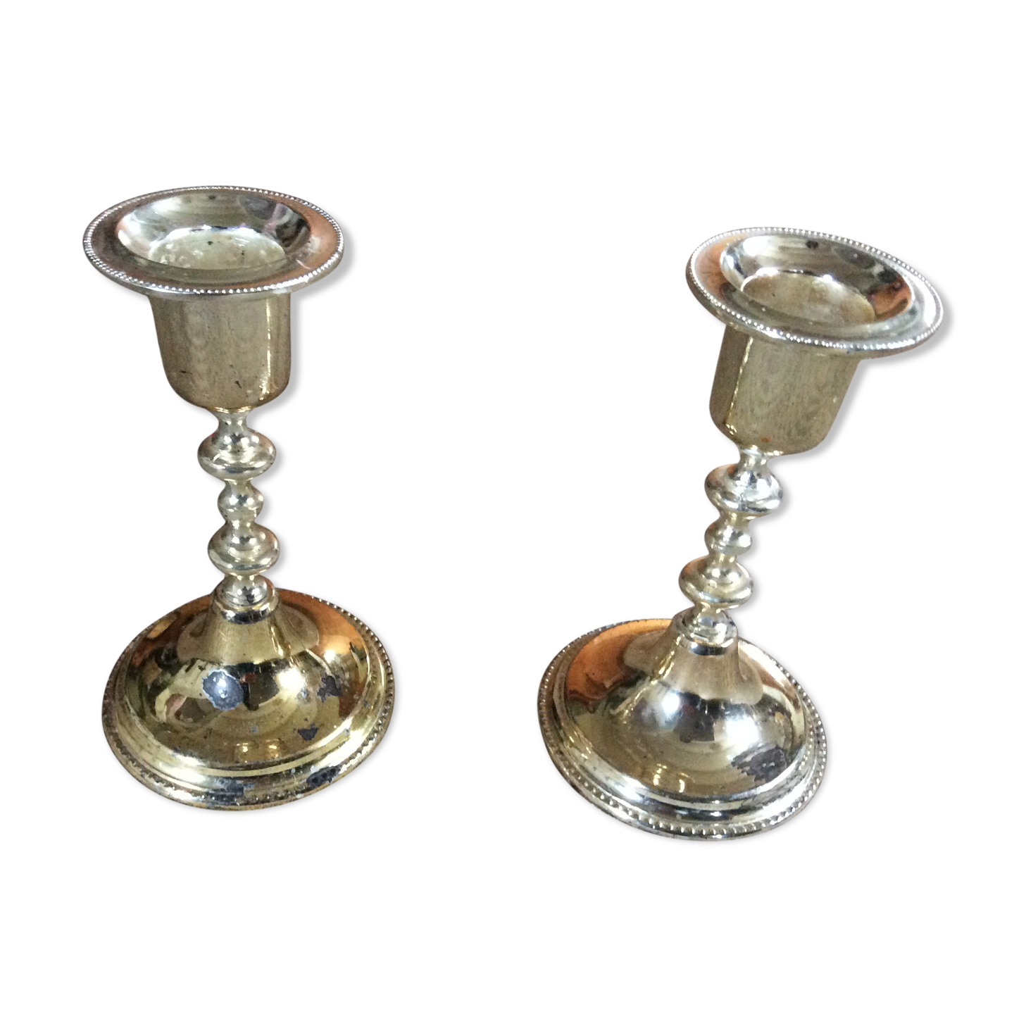 Pair of gold metal candle holders