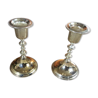Pair of gold metal candle holders