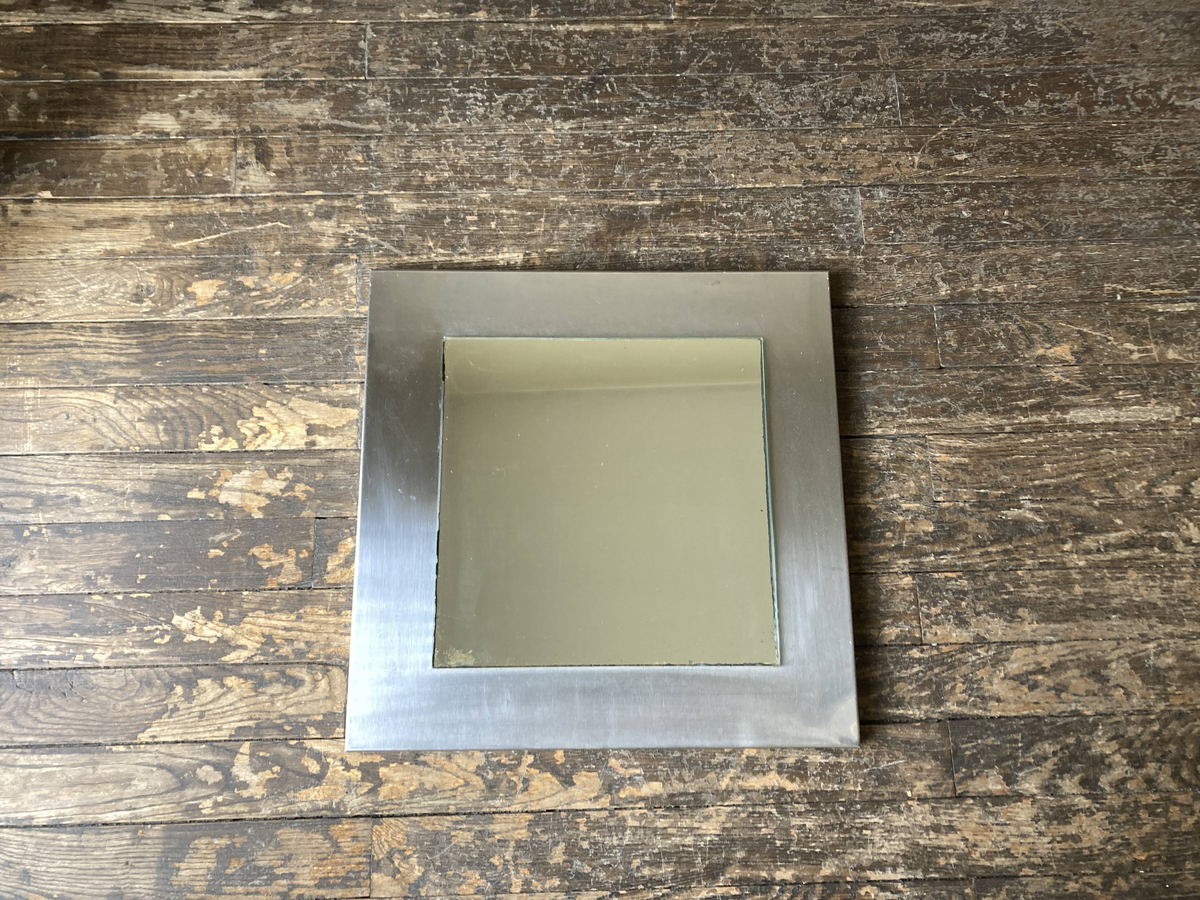 1970s space age steel mirror