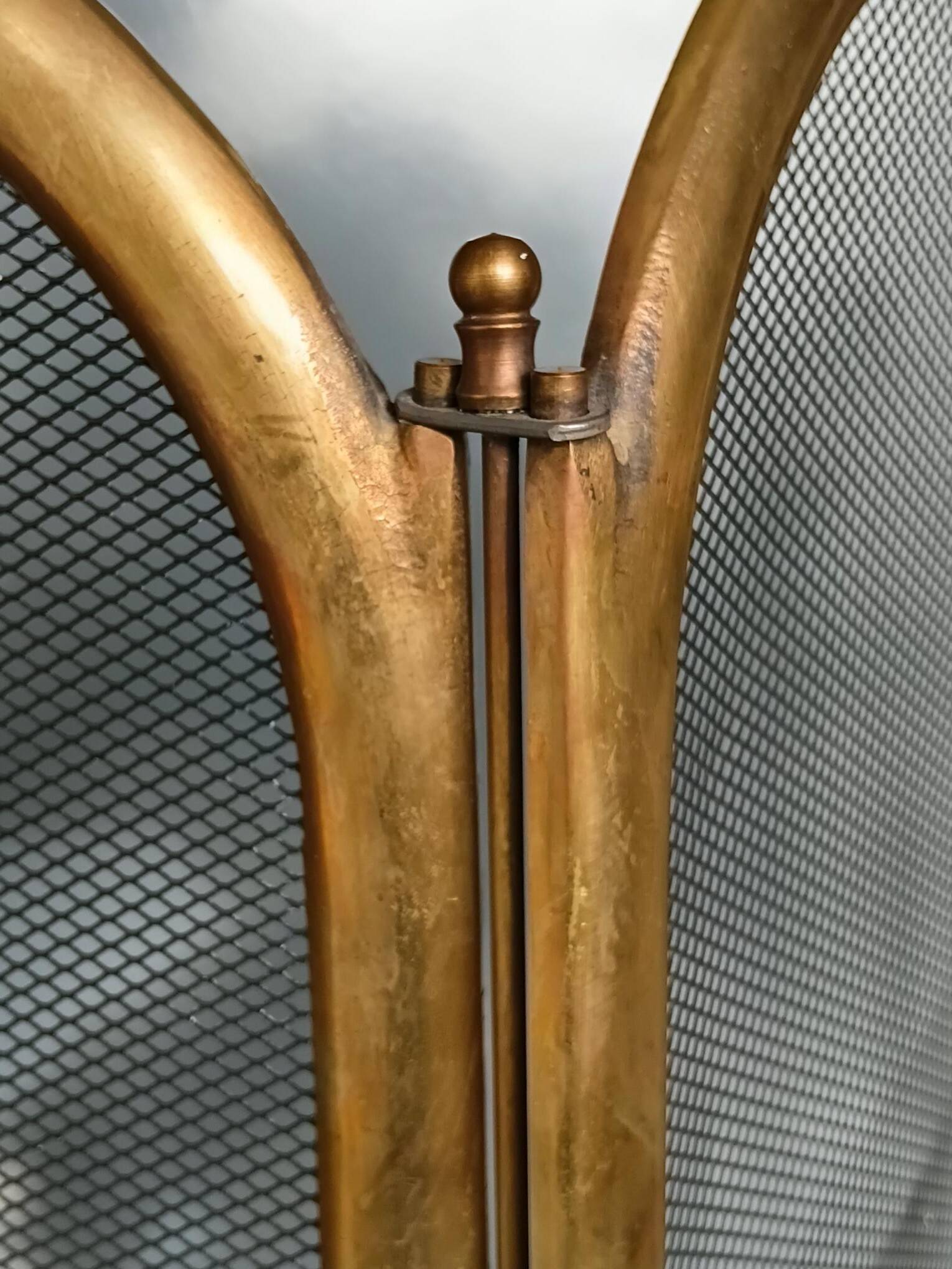 1920s brass fire screen with splash protection