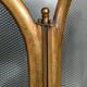 1920s brass fire screen with splash protection
