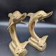 Pair of brass dolphins bookends