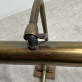 Wall light, picture light, in brass.