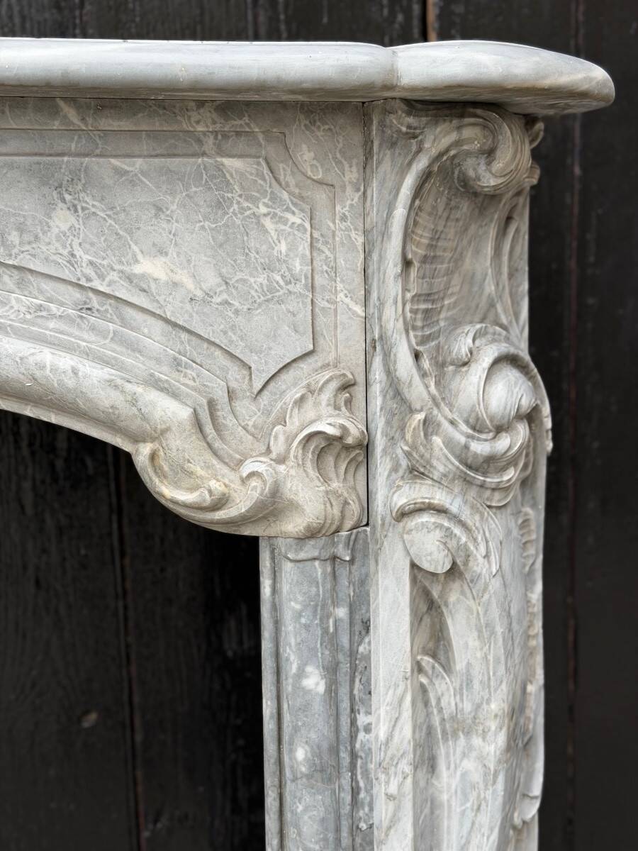 Louis XV fireplace in blue Turquin marble, 18th century.