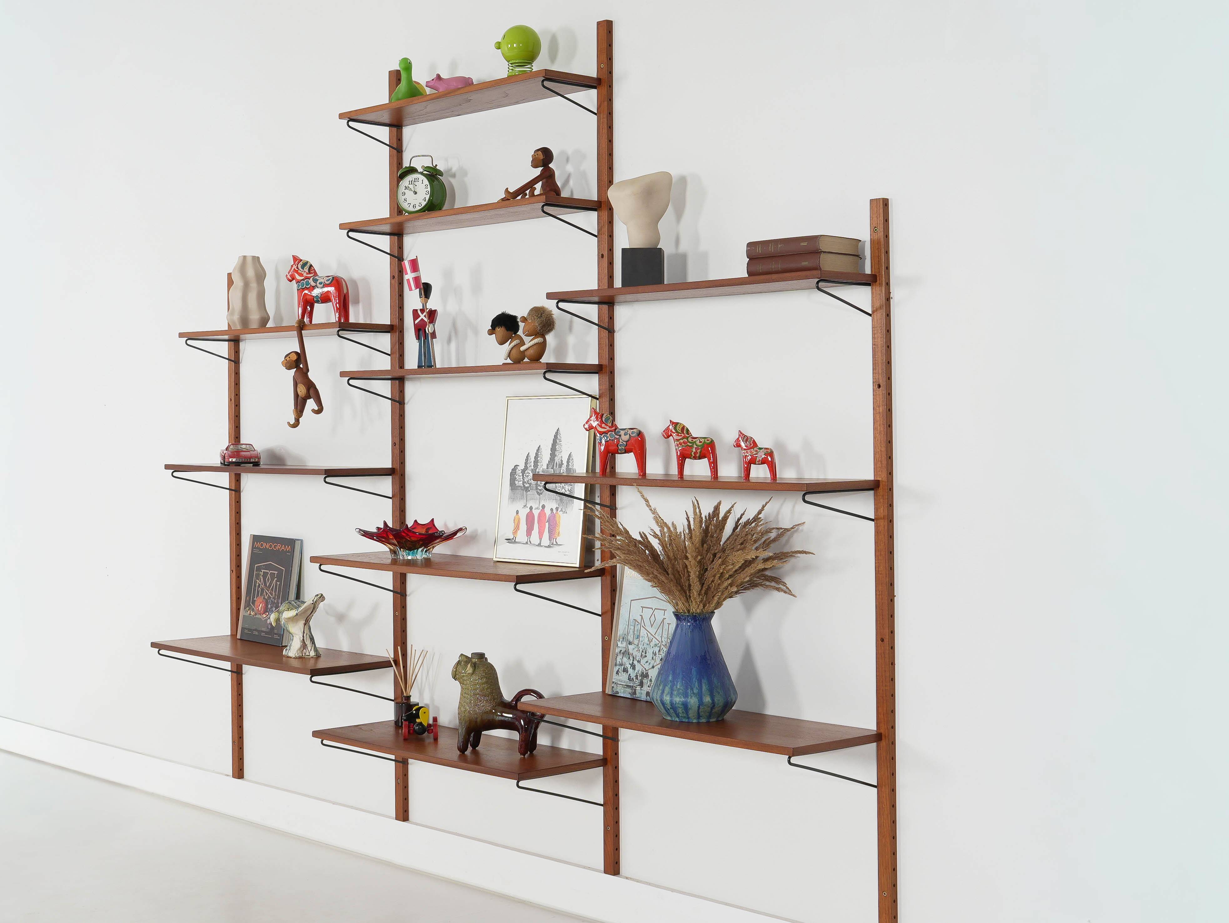 Modular shelving from the 1960s — Danish teak veneer wall system