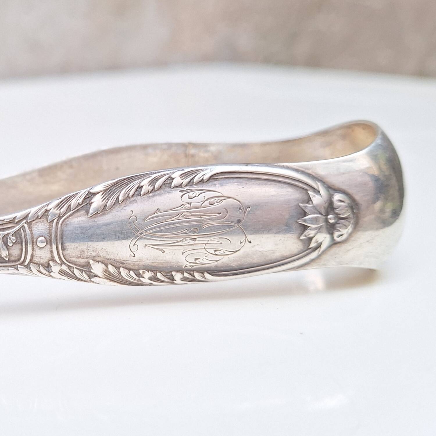 Solid silver sugar or ice tongs with lion's paw decoration