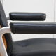 Vintage swivel office armchair in black leather and wood by Giroflex 60s