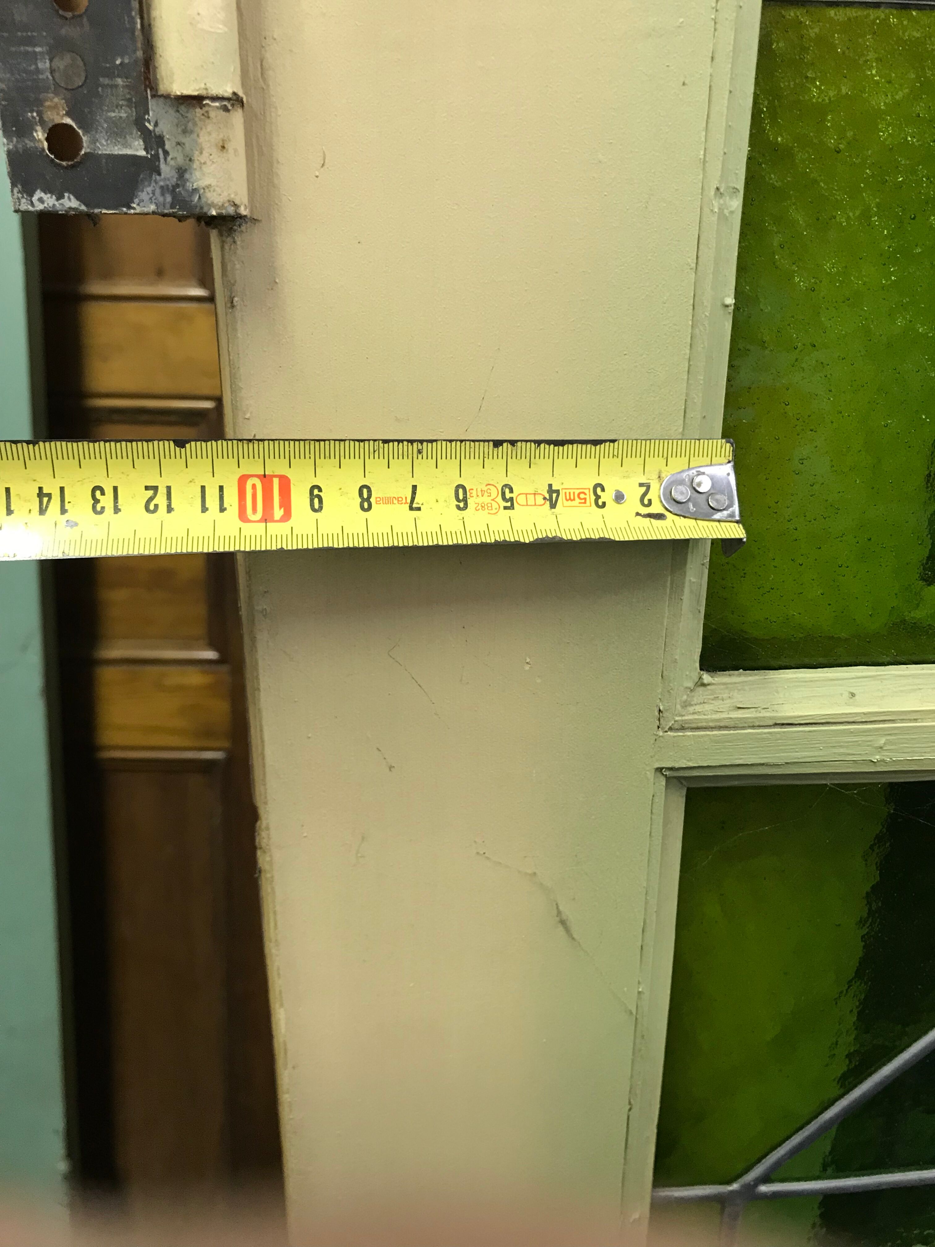 Series of three doors with stained glass windows