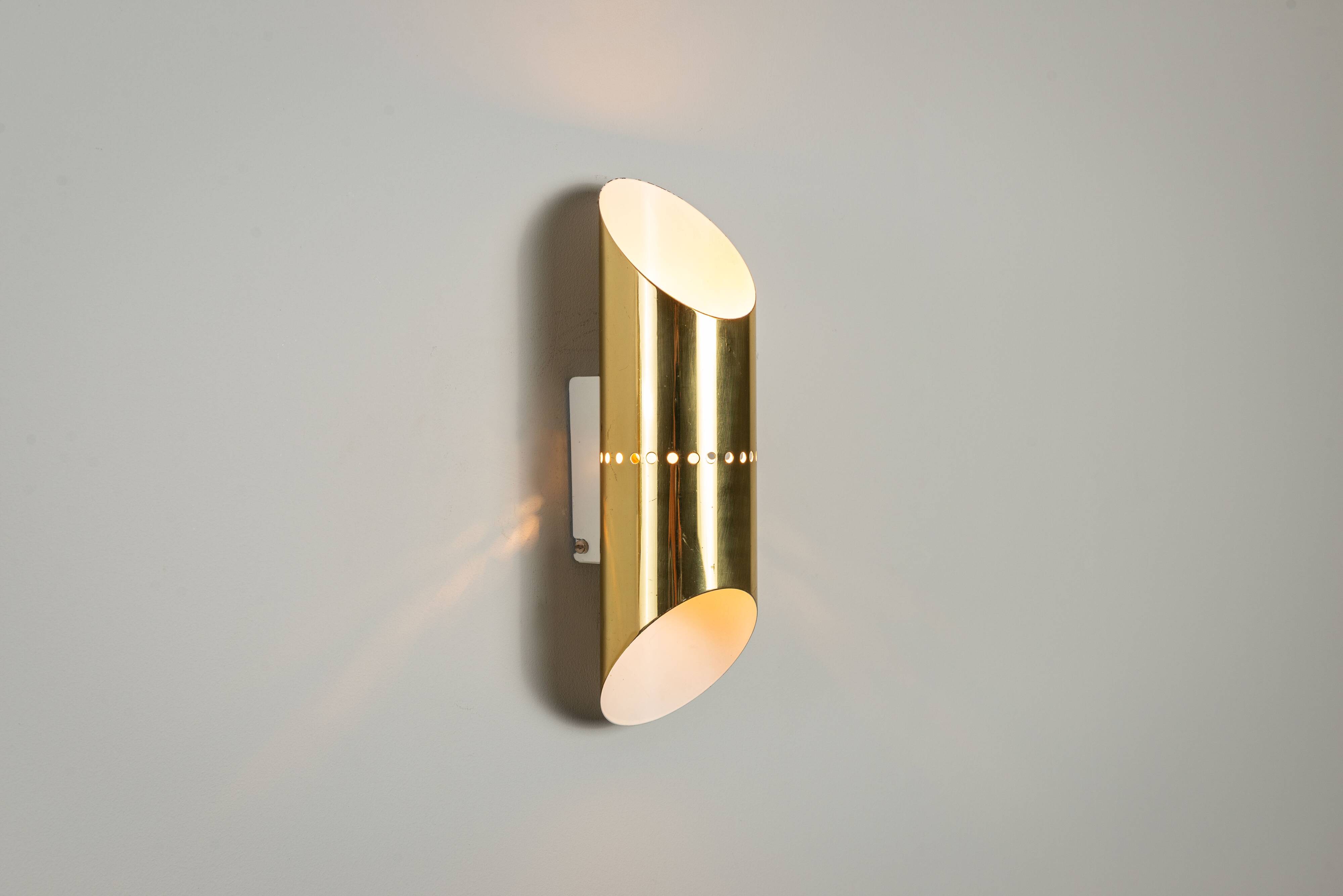Pair of cylindrical wall lamps in brass with perforated shades