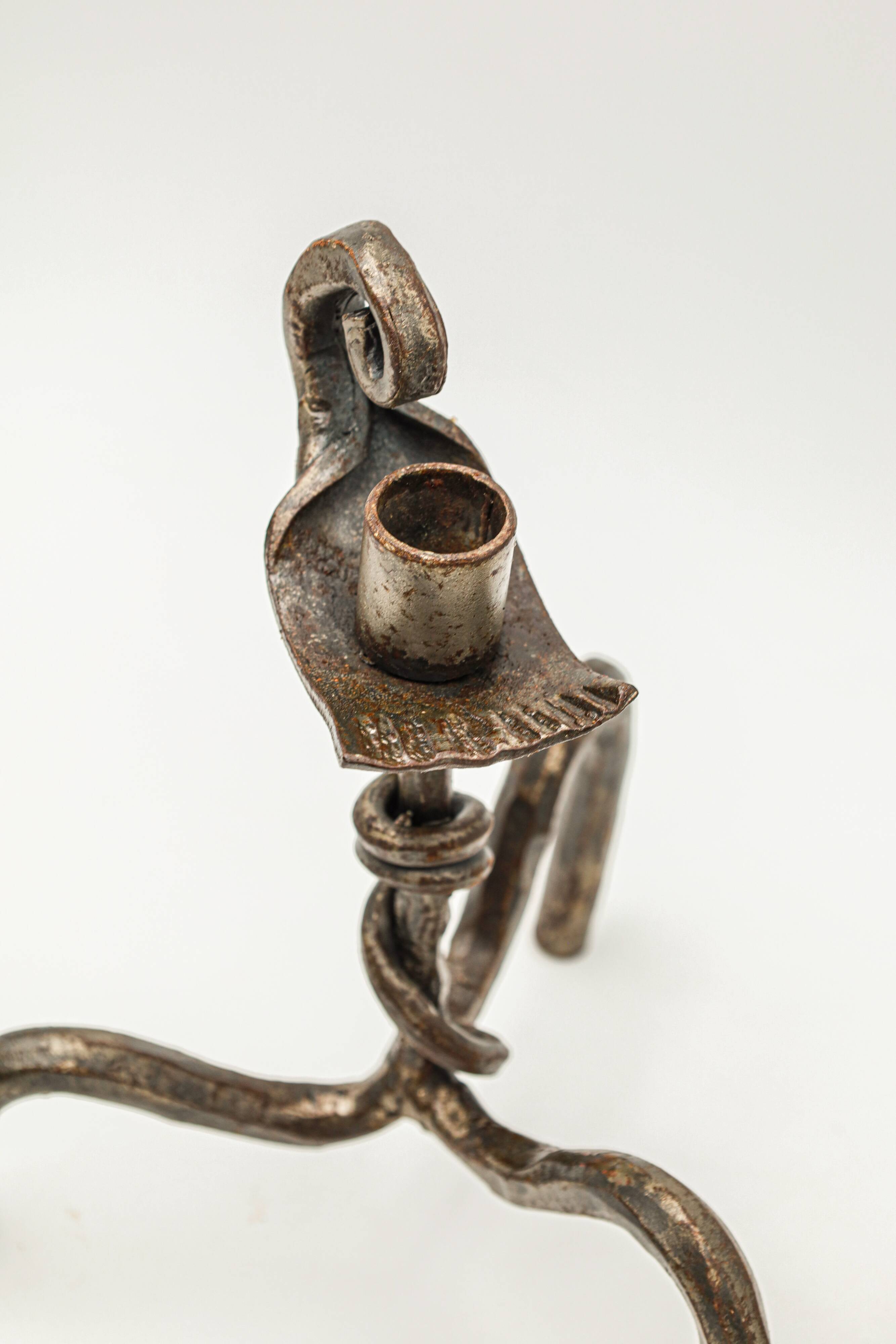 Pair of brutalist wrought iron candlesticks, French work, 1950s-1960s