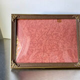 Metal frame in gold colored brass