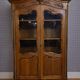 Large Provençal glass-fronted library in Louis XV style made of walnut – 20th century