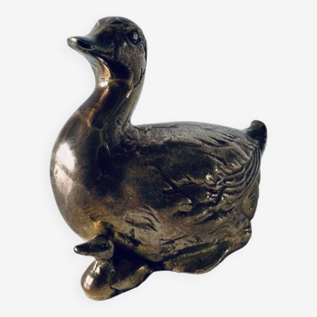 Duck with its vintage brass duckling