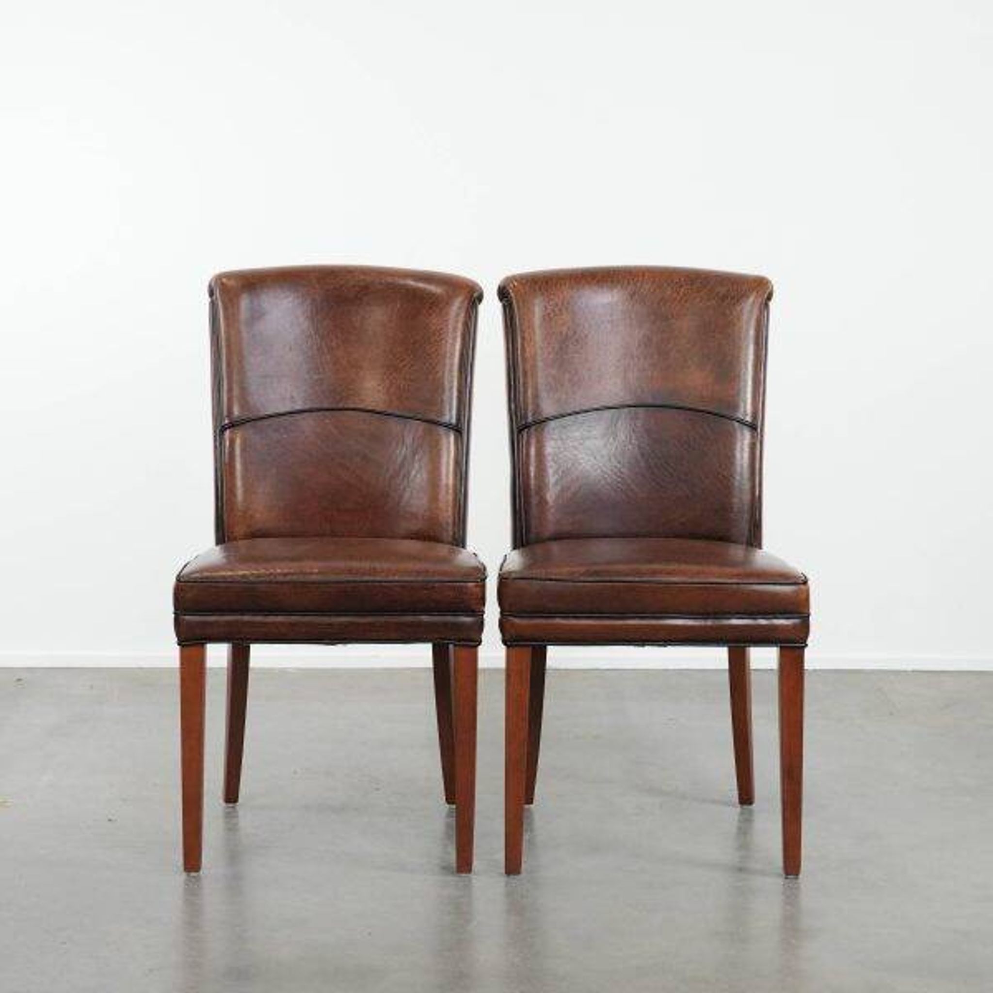 Comfortable set of 2 sheep leather dining chairs with character