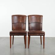 Comfortable set of 2 sheep leather dining chairs with character