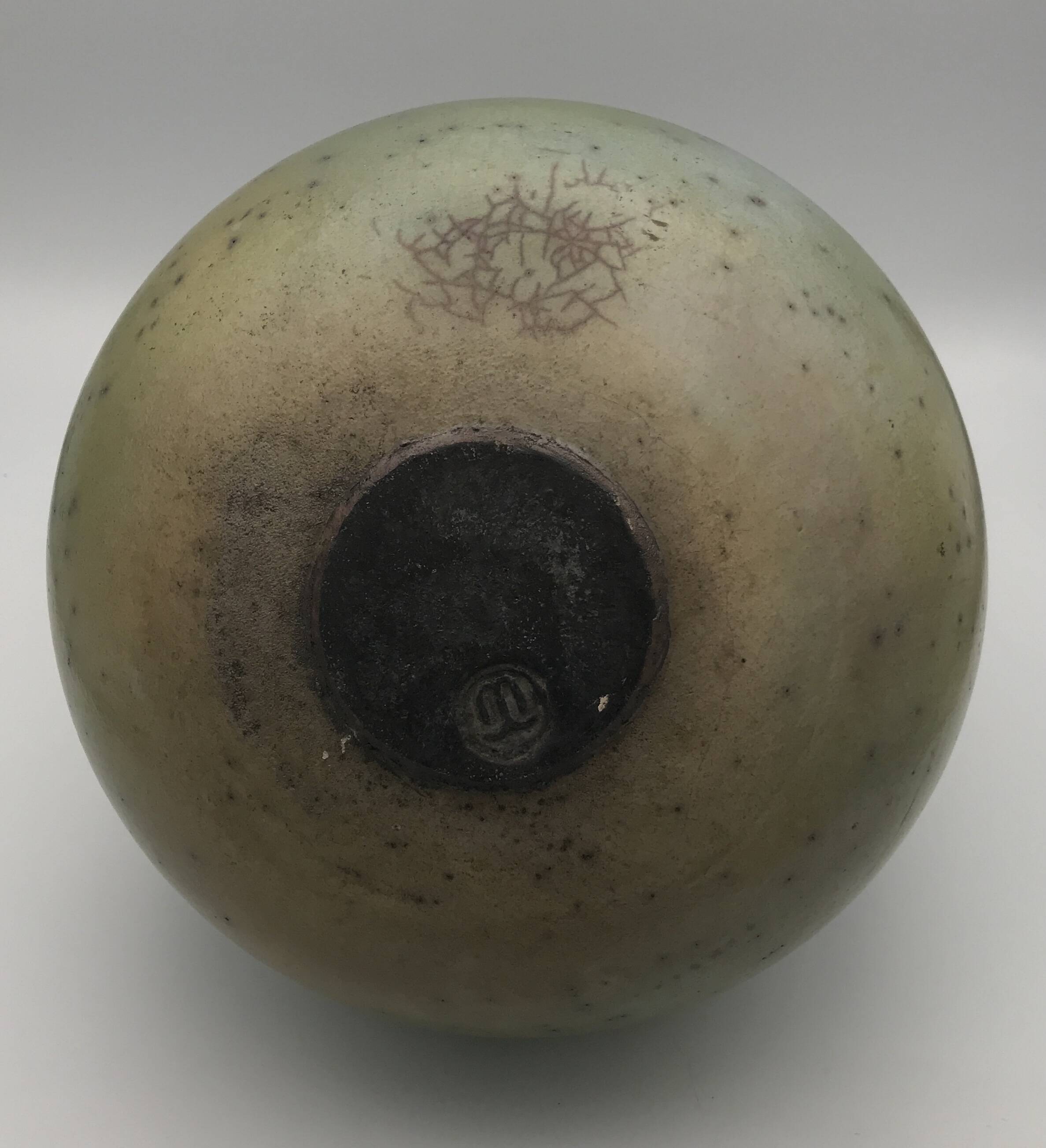 Contemporary vase ball shape raku shades of green and yellow