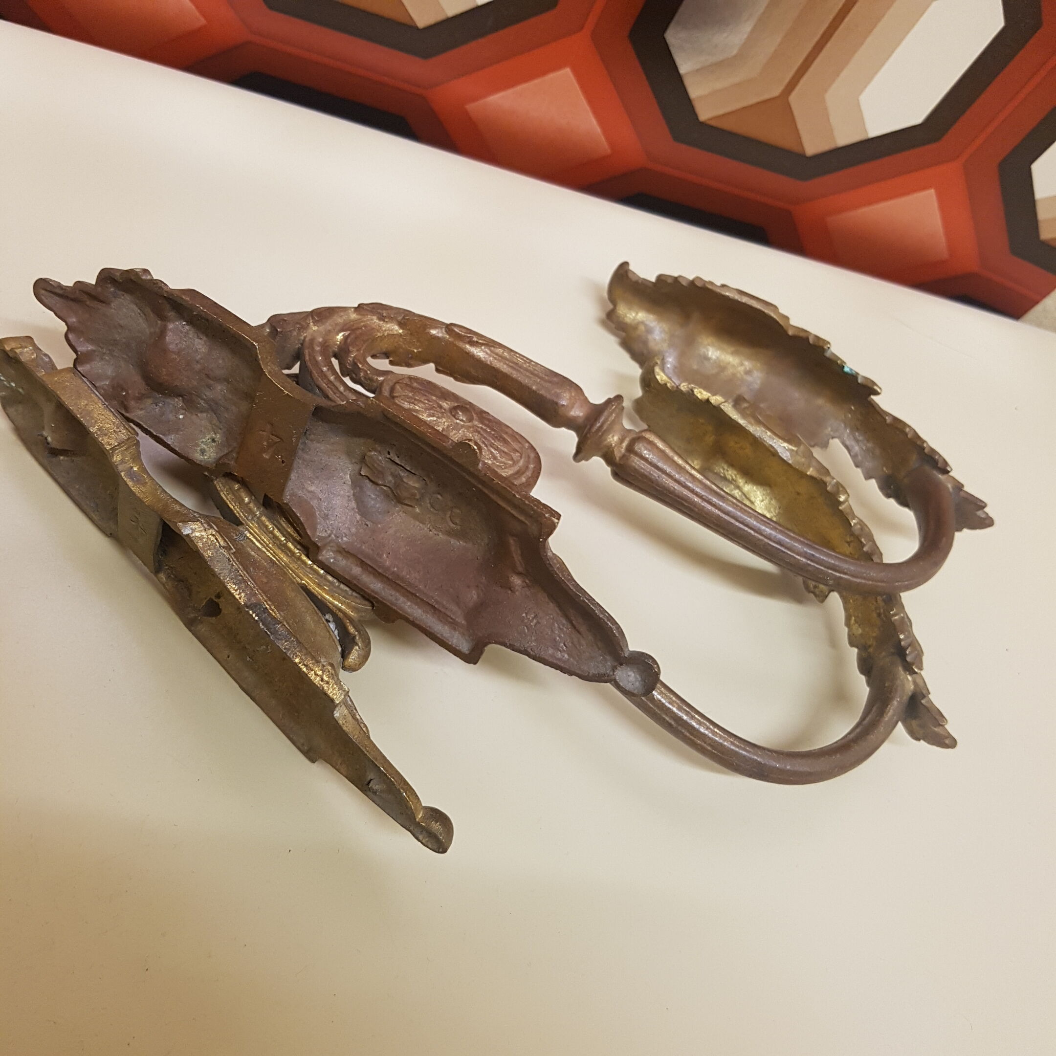 Pair of gilt bronze pegs