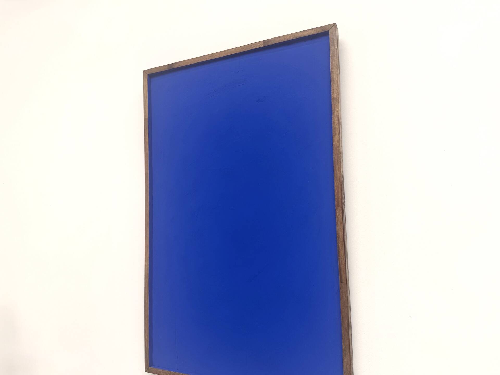 Monochrome table in ultramarine blue, acrylic on solid wood.