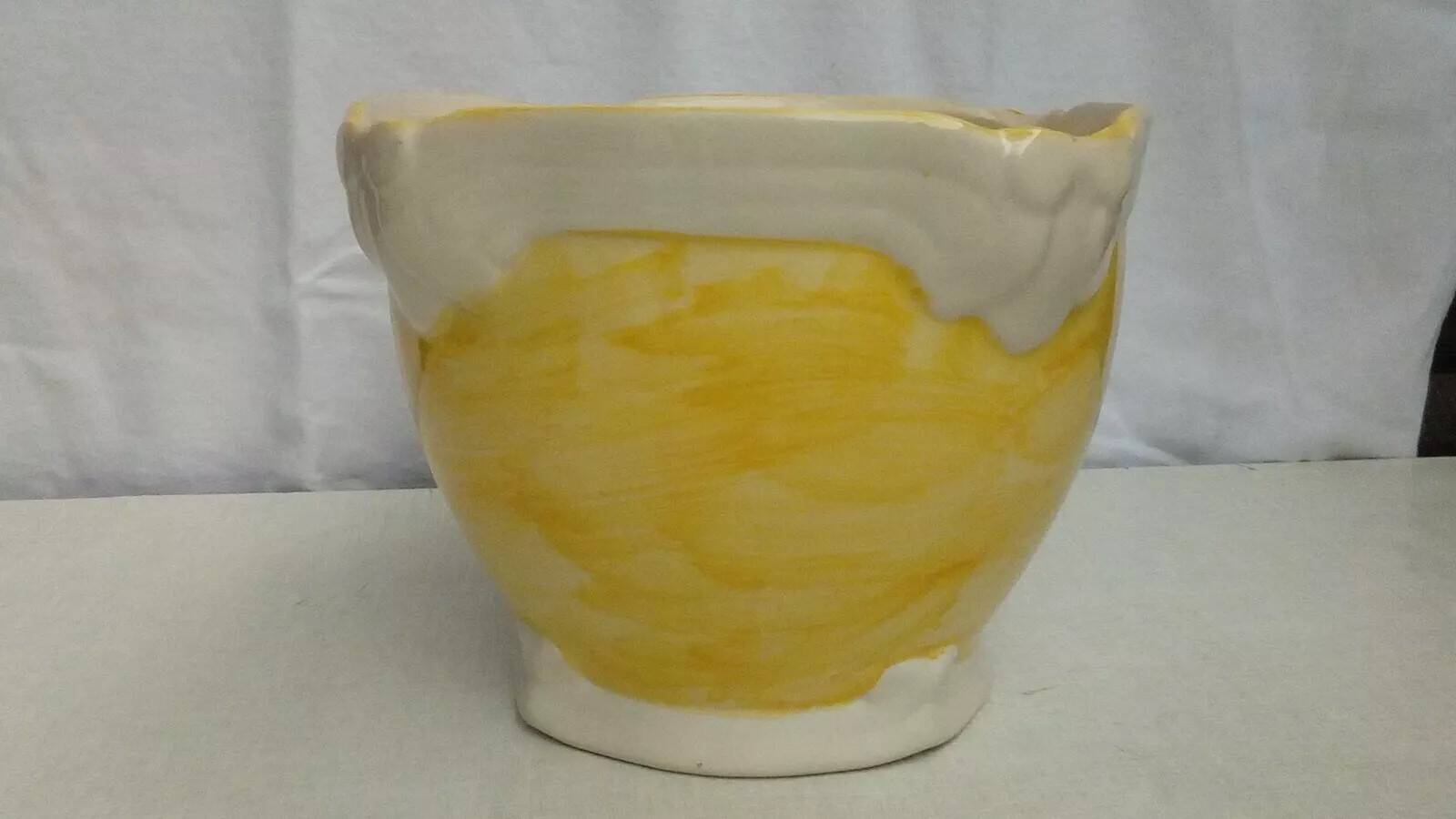 Earthenware planter with towel painting decor