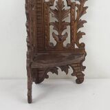 Carved wooden corner shelf