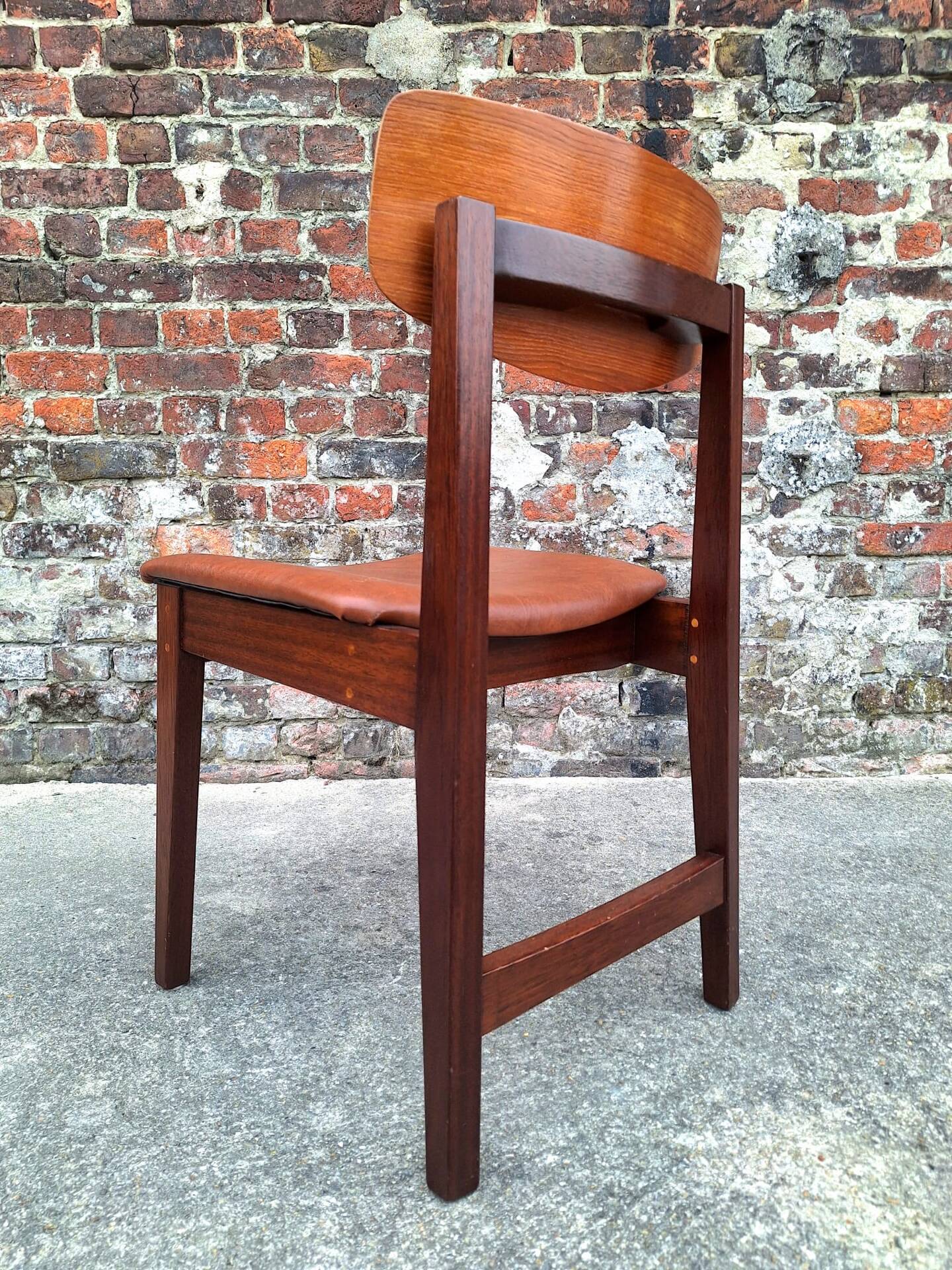 Vintage Scandinavian chair in teak, antique seating furniture.