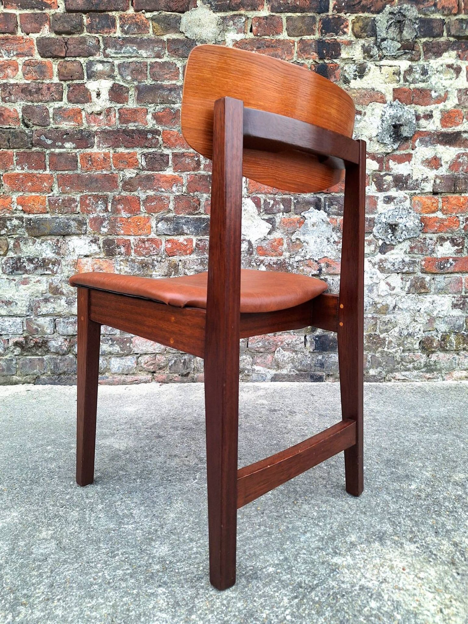 Vintage Scandinavian chair in teak, antique seating furniture.